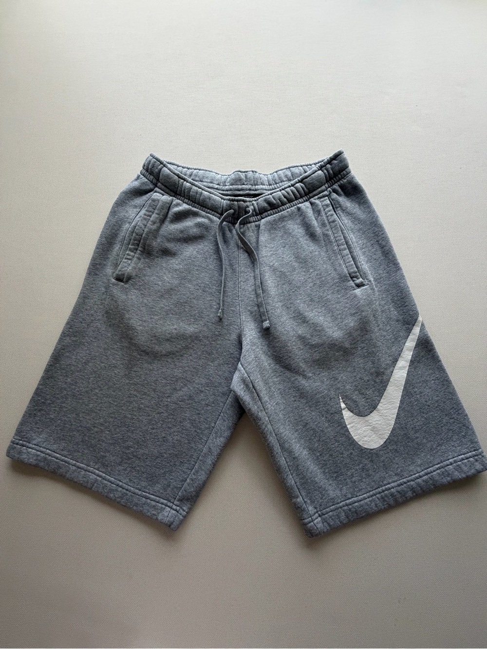 Nike Grey Shorts with Large White Swoosh